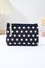 Polka dot cosmetic clutch